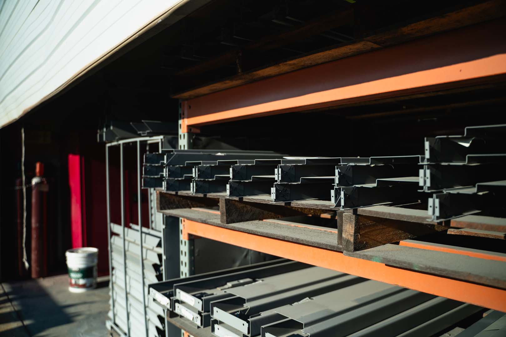 Hollow metal frames racked in the Midwest Door fabrication shop